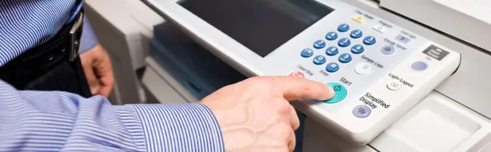 Copy Service | The Document Group | The Document Group Copy machine being used - close up